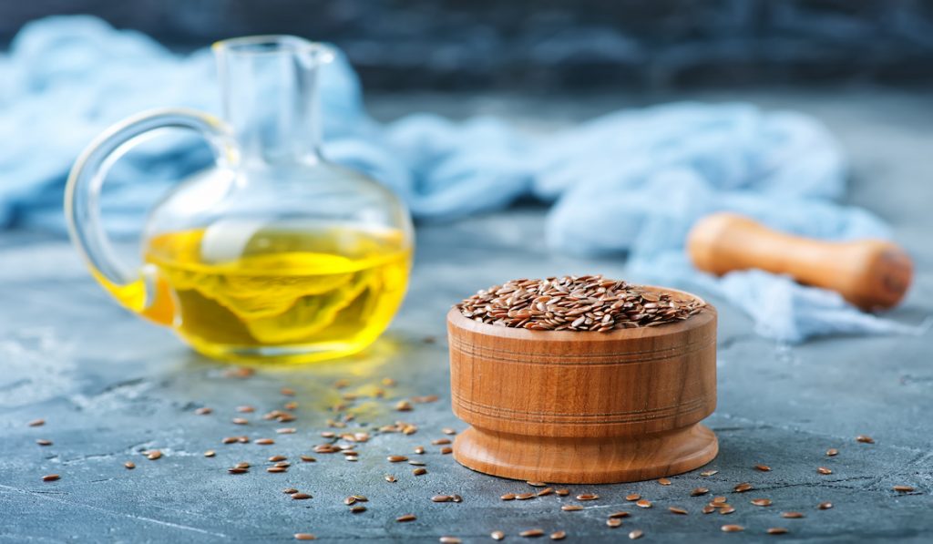 flaxseed and a bottle of oil 
