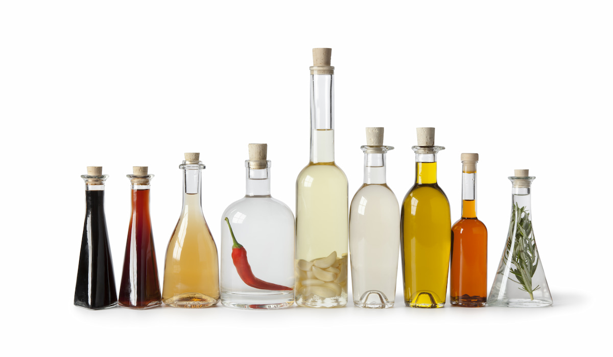 different bottles with different kinds of vinegar