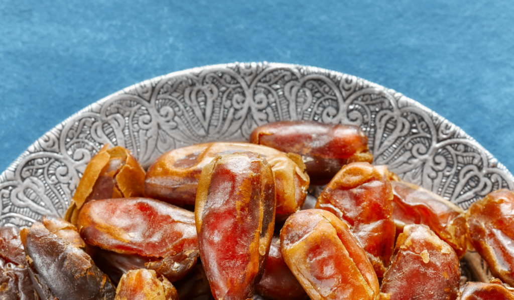 Dried dates on a plate.