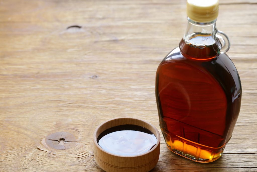 maple syrup bottle on table