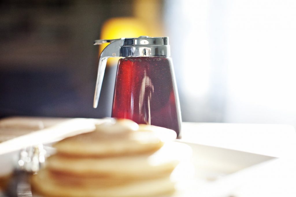 pancakes-and-maple-syrup-at-the-breakfast-table