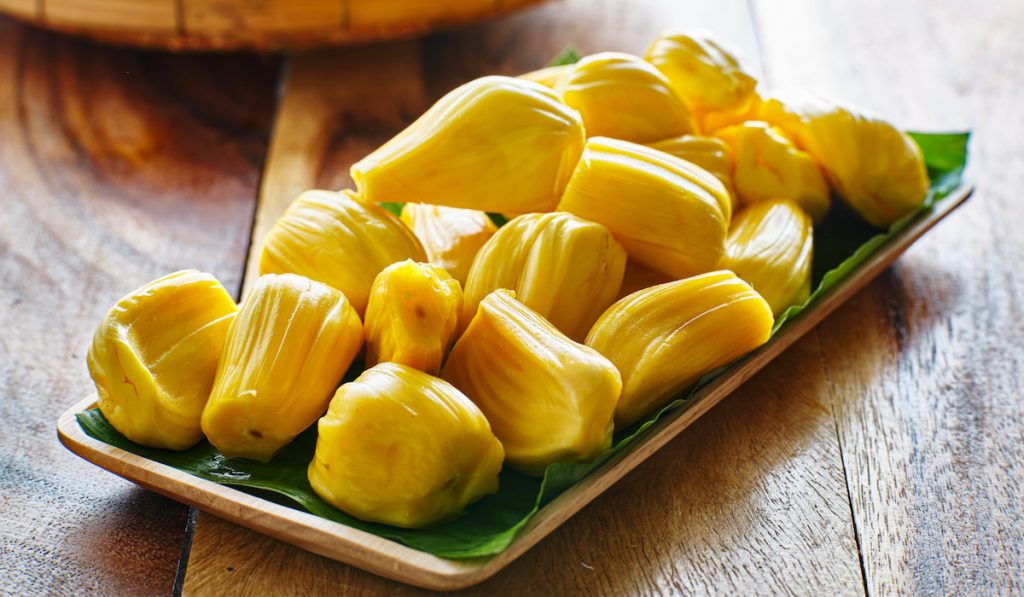 peeled jackfruit on banana leaves 