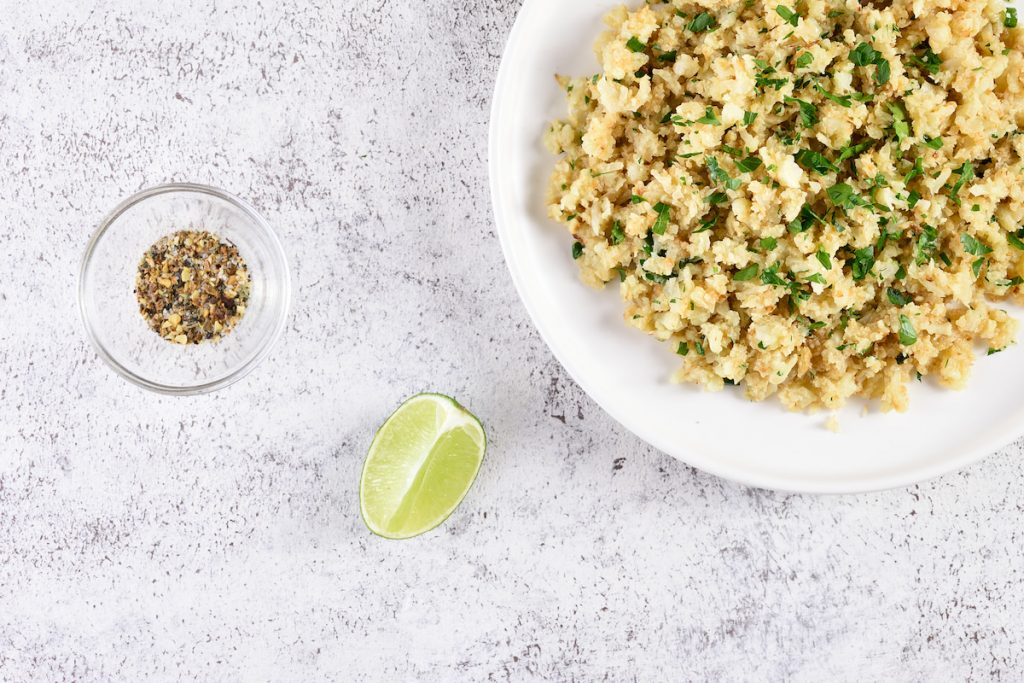 roasted cauliflower rice in white bowl 